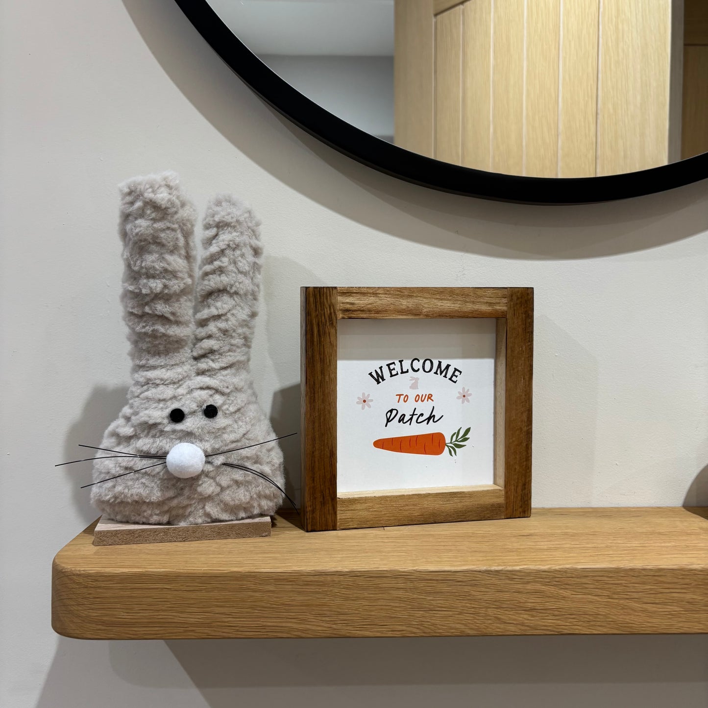 Fluffy bunny on wood base