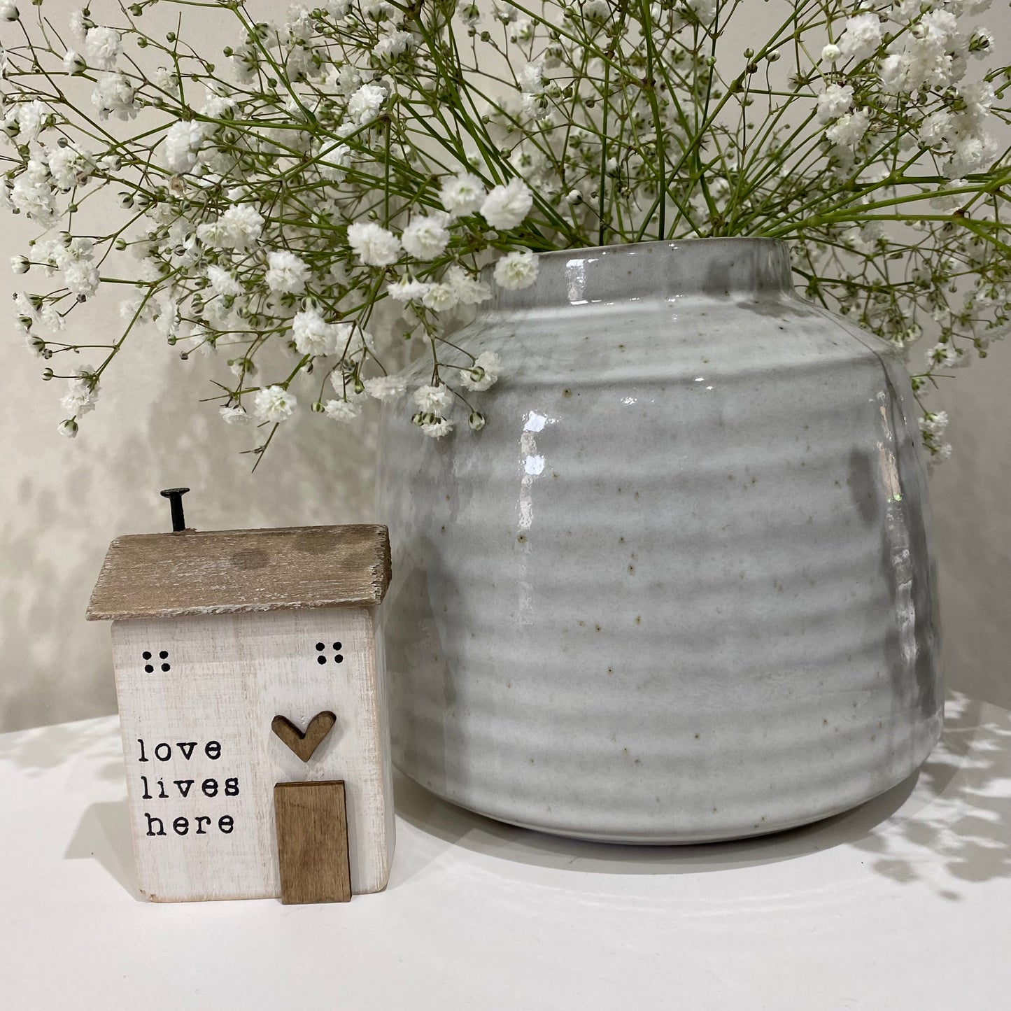 Love Lives Here Wooden House