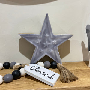 Rustic mango wood and grey enamel star