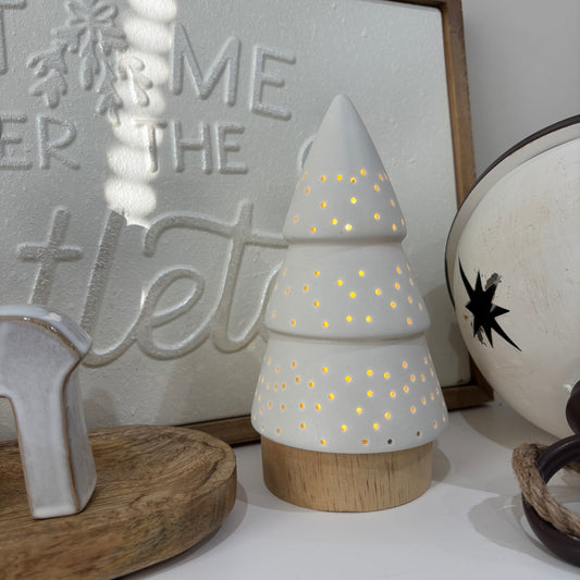 White light up tree on wood base