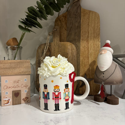 Nutcracker print mug with bow