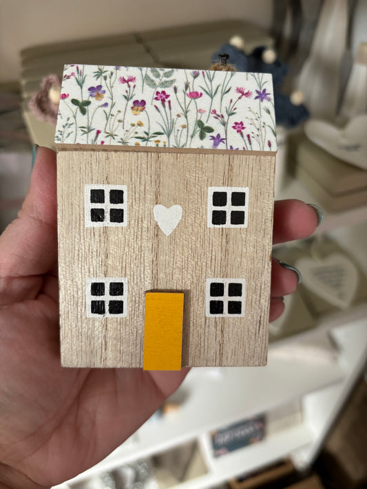 Wood house with floral roof