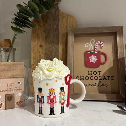 Nutcracker print mug with bow