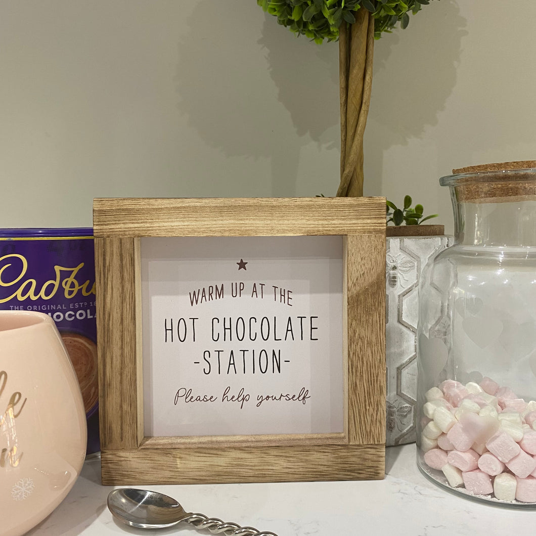 Warm up at the Hot Chocolate Station Sign