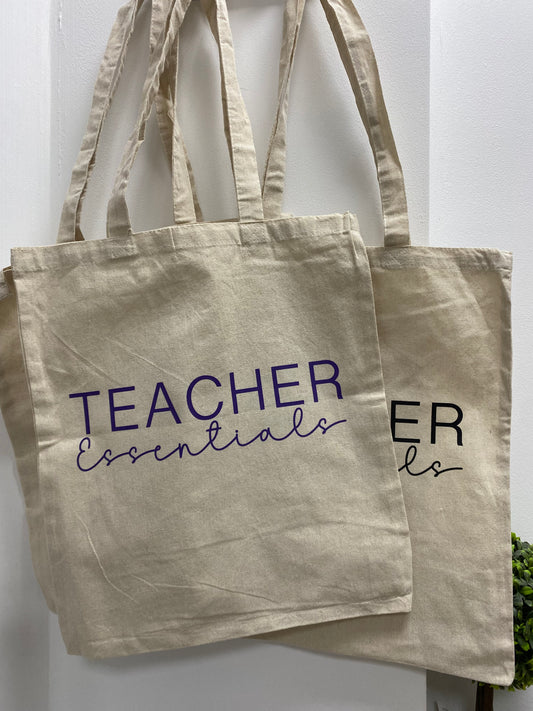 Teacher Essentials bag purple font