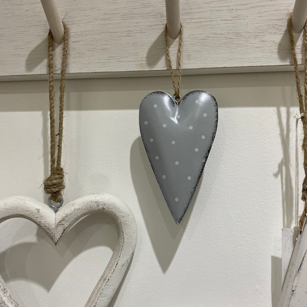 Grey metal heart with white spots