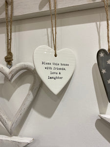 Bless this house with good friends, love and laughter ceramic hanging heart