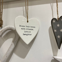 Load image into Gallery viewer, Bless this house with good friends, love and laughter ceramic hanging heart